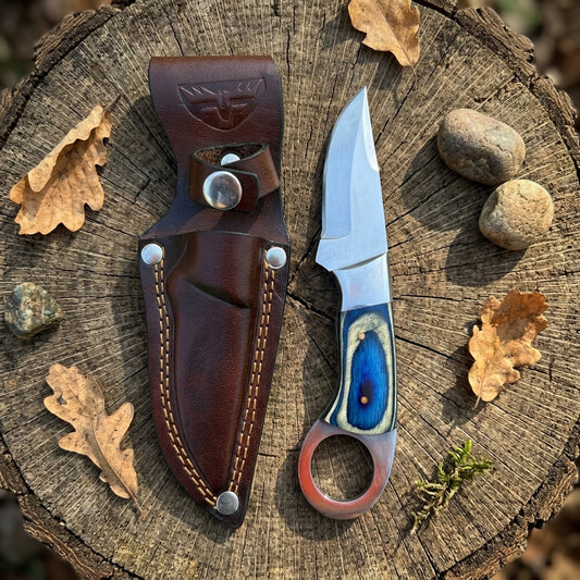 Fixed blade skinner knife with multicolor wood handle, stainless steel ring, and cowhide leather sheath