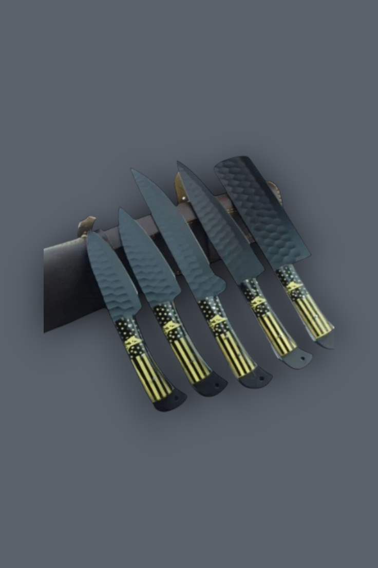 Five kitchen knives with textured dark gray blades and handles featuring a black and yellow American flag pattern, displayed on a dark gray background.