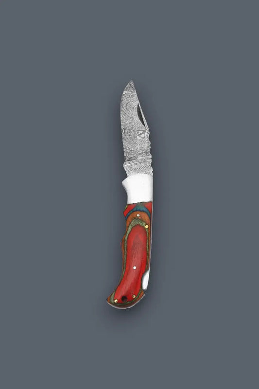 Vertical profile of the fully open Olde Townie Damascus folding knife showcasing the multicolor wood handle and lockback mechanism
