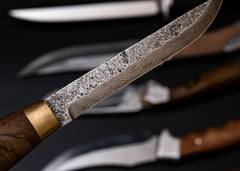 The Enduring Appeal of Damascus Hunting Knives: Strength, Style, and Performance