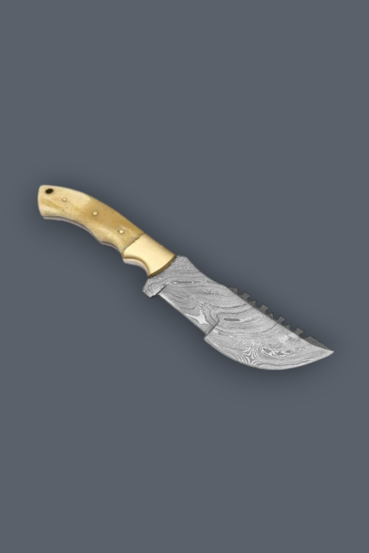 A fixed-blade knife with a patterned steel blade and a light tan handle, shown diagonally on a solid dark gray background.