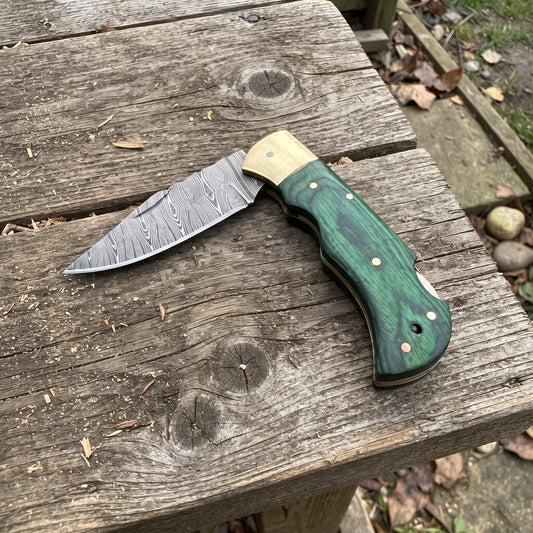 The Trailwood — Handmade Damascus Steel Folding Pocket Knife with Green Pakkawood Handle, Brass Bolster & Leather Sheath