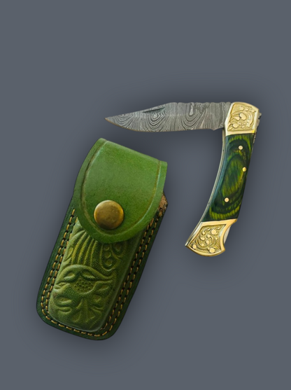 Premium handmade Damascus steel folding knife with artistic green resin handle for everyday carry