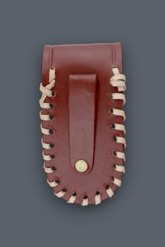A reddish-brown leather pouch with cream-colored whipstitched edges and a snap-button closure, shown against a solid dark gray background.