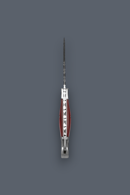 A compact multi-tool pocket knife with a silver metal body and reddish-brown accents, shown vertically against a solid dark gray background.