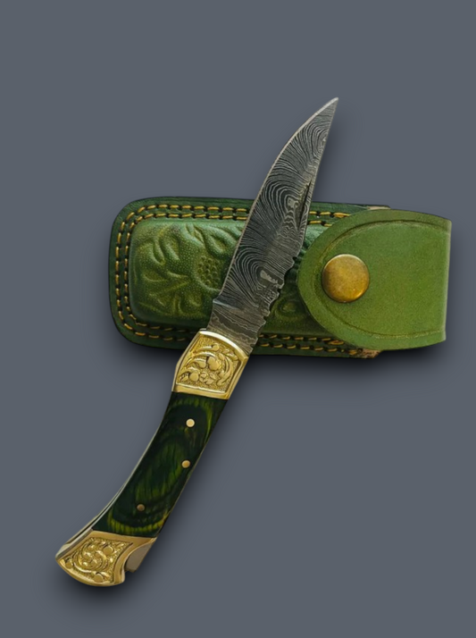 Handmade Damascus steel folding pocket knife with green resin handle and embossed leather sheath