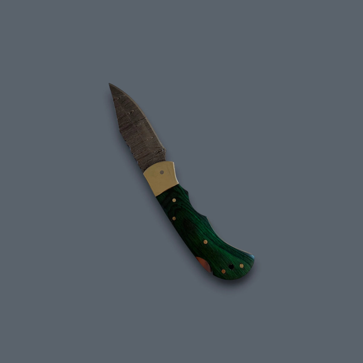 A folding pocket knife with a dark green textured handle, gold-toned bolster and pins, and a dark steel blade, shown on a solid dark gray background.