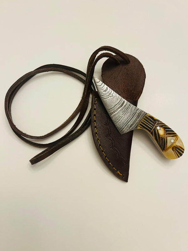 MB-103 miniature Damascen bone handle necklace skinner. Blade size 2.25” hanlde size 1.5” total length 3.75”