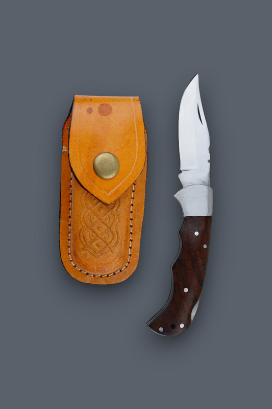 A fixed-blade knife with a silver blade and dark brown wooden handle, shown next to its tan leather sheath on a solid dark gray background.