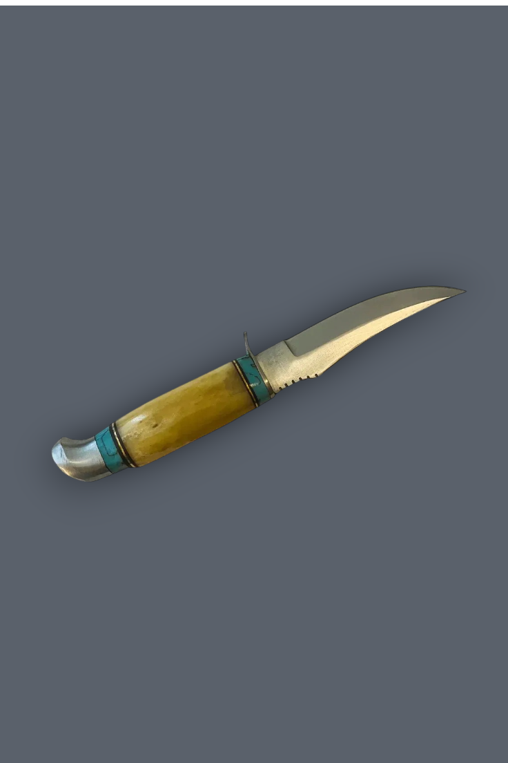 A traditional hunting knife with a curved yellow-bone handle, turquoise inlay bands, and a silver steel blade, shown on a solid dark gray background.