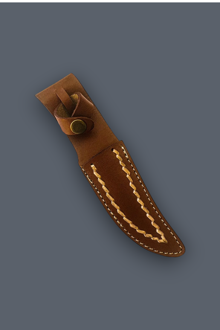 A brown leather knife sheath with decorative contrast stitching and a brass snap closure, shown diagonally on a solid dark gray background.