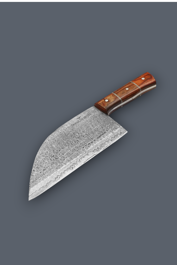 A chef's knife with a textured, patterned steel blade and a reddish-brown wooden handle, shown diagonally on a solid dark gray background.