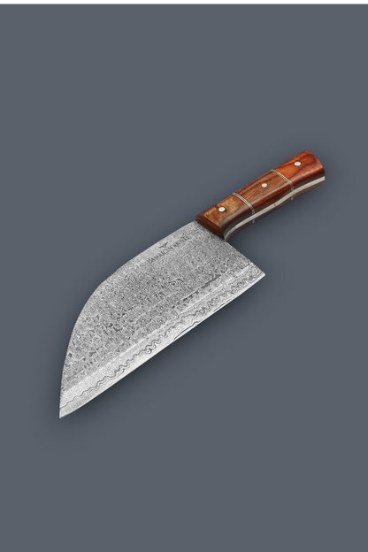 A chef's knife with a textured, patterned steel blade and a reddish-brown wooden handle, shown diagonally on a solid dark gray background.