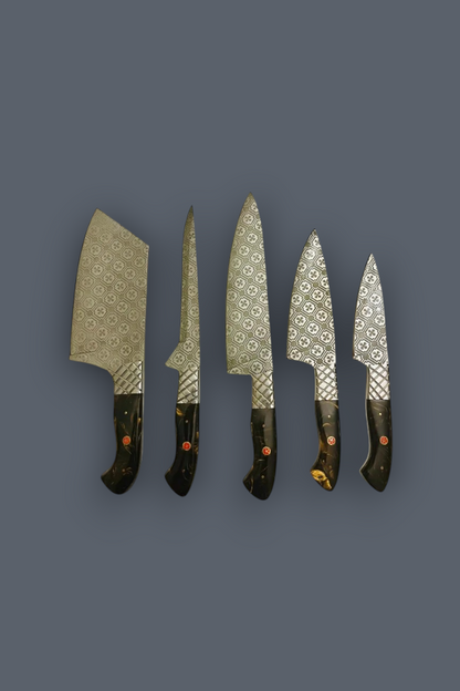 Five kitchen knives with patterned silver blades and dark handles arranged vertically on a solid dark gray background.