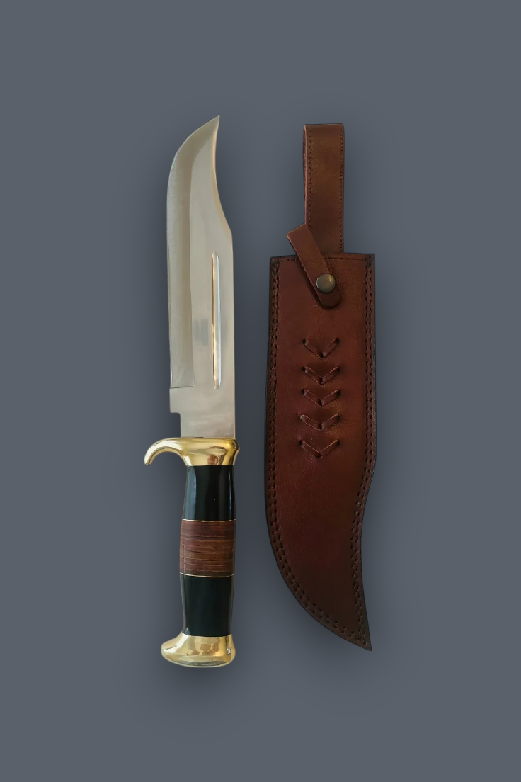 A fixed-blade knife with a curved silver blade, brass guard and pommel, and a dark handle wrapped with brown leather, shown next to its brown leather sheath on a solid dark gray background.