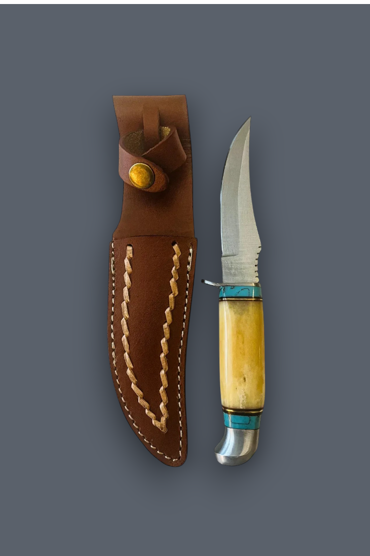 A fixed-blade knife with a polished steel blade, a yellow bone handle, and turquoise accents, displayed next to its brown leather sheath with cream stitching on a dark gray background.