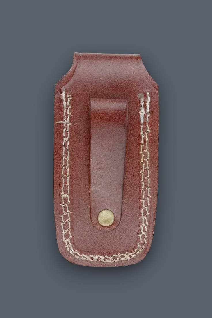 A reddish-brown leather belt holster with white contrast stitching and a brass snap button, shown against a dark gray background.