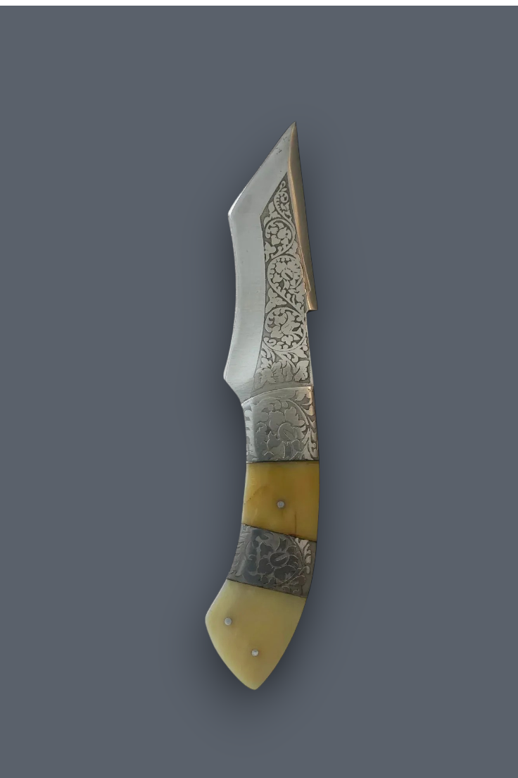 A decorative folding pocket knife with an engraved steel blade, a silver-toned bolster, and a handle made of alternating cream bone and patterned steel inlays, shown against a solid dark gray background.