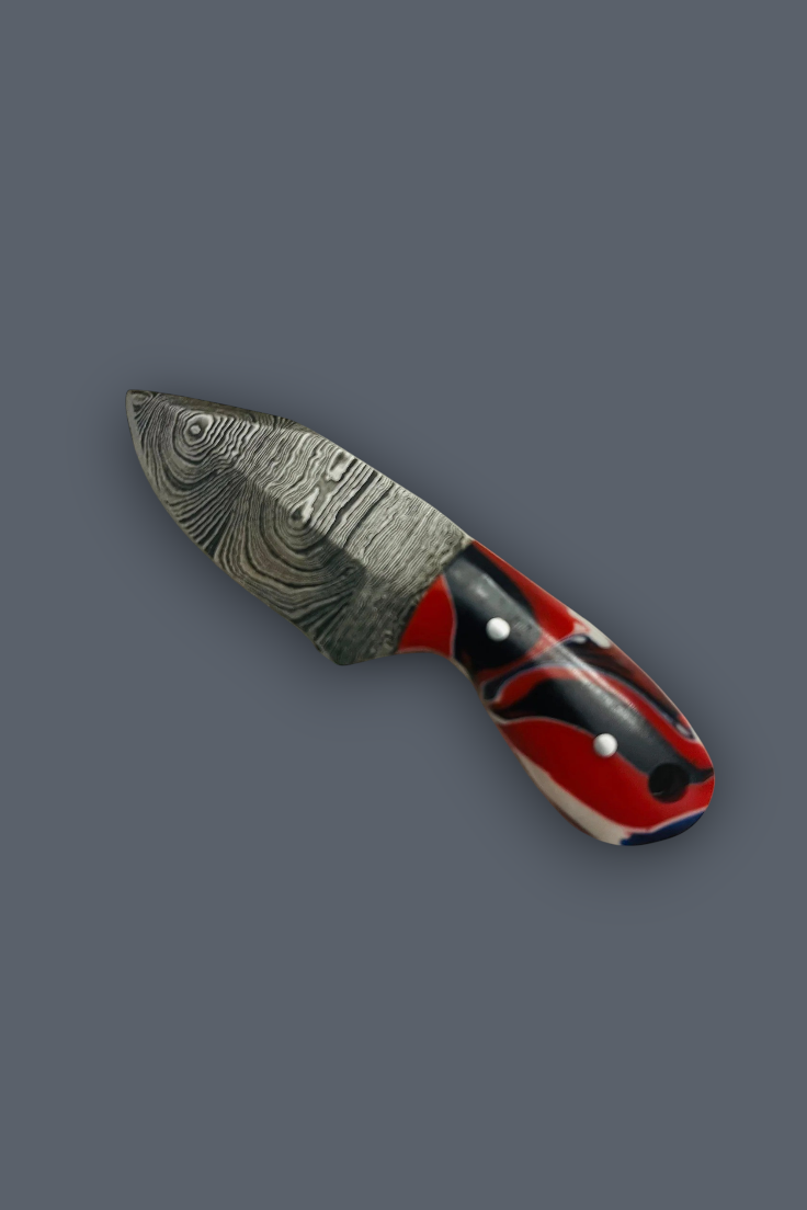 A custom fixed-blade knife with a patterned Damascus steel blade and a red, black, and white handle, shown on a solid dark gray background.