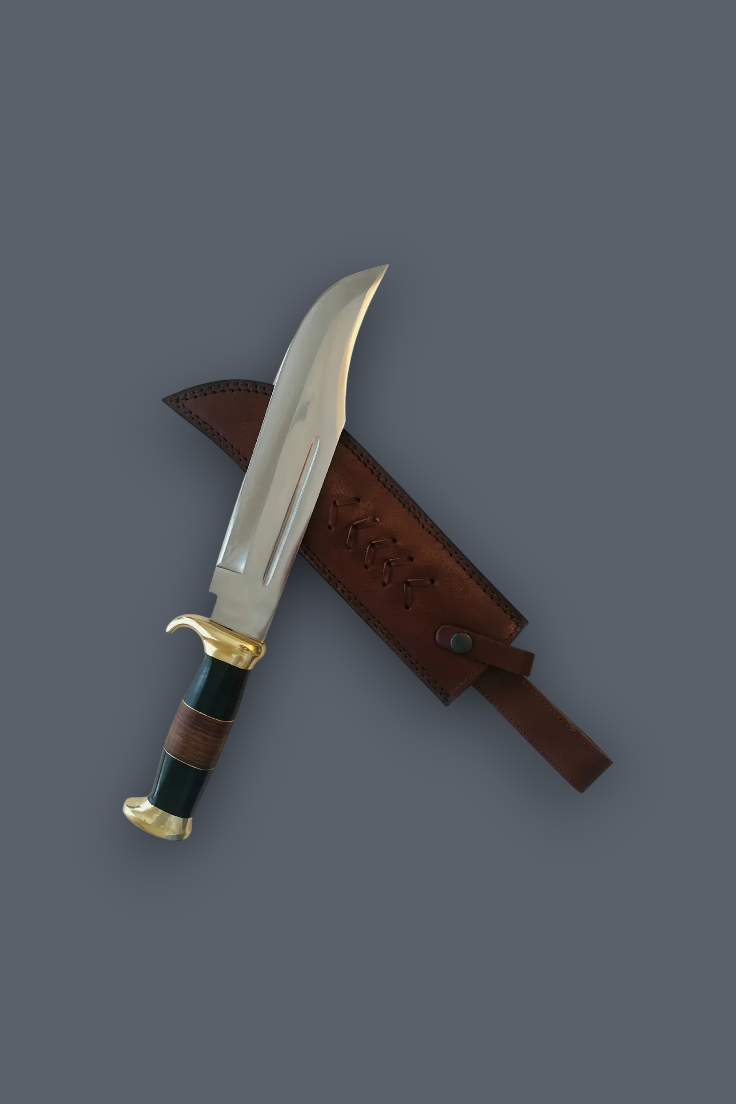 A curved fixed-blade knife with a polished silver blade, gold-toned guard and pommel, and a dark green and brown wrapped handle, shown resting against a brown leather sheath on a solid dark gray background.