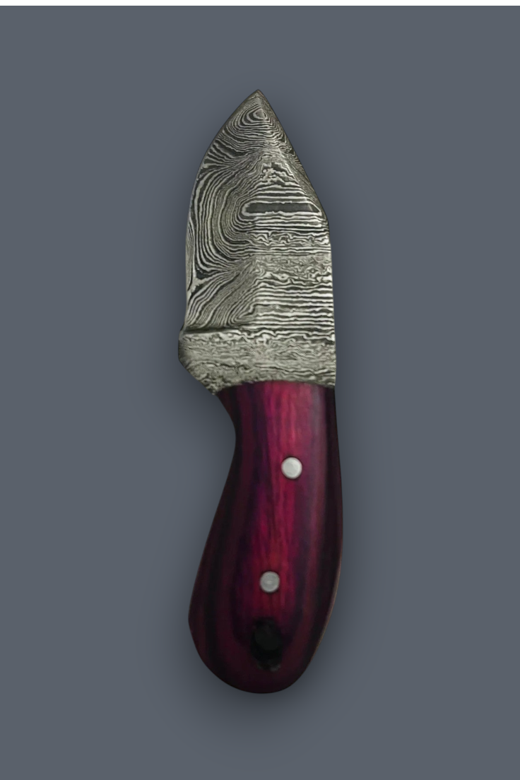 A small fixed-blade knife with a patterned Damascus-style steel blade and a dark reddish-brown wooden handle with silver rivets, shown on a plain gray background.