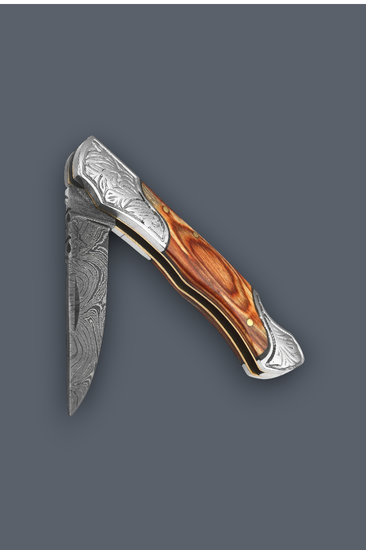 A folding pocket knife with a Damascus steel blade and a polished wood handle, shown against a solid dark gray background.