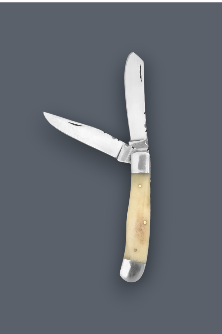 A folding pocket knife with two blades partially open, featuring a light natural bone or horn handle and silver-toned metal blades and bolsters, shown against a solid dark gray background.