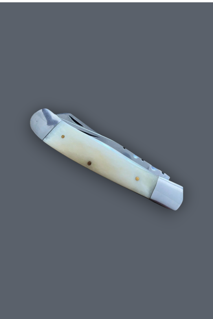 A classic folding pocket knife with a cream-colored bone handle and a silver metal blade, shown against a solid dark gray background.