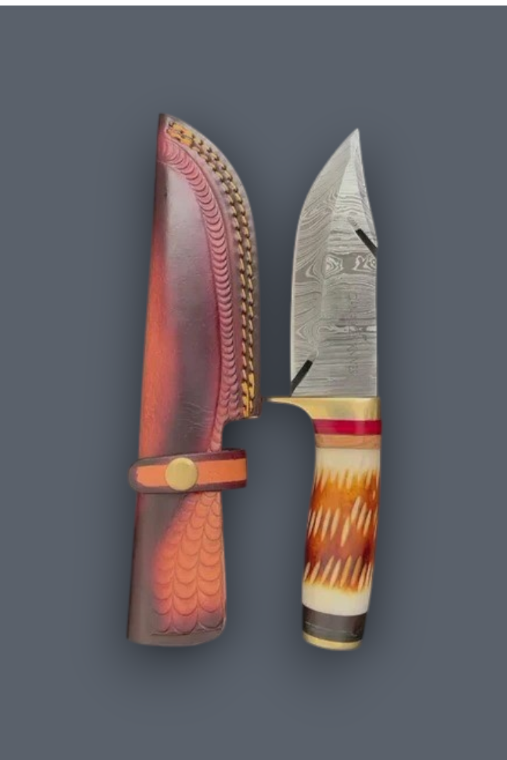 A fixed-blade knife with a patterned steel blade and a carved handle, shown next to its matching sheath on a solid dark gray background.