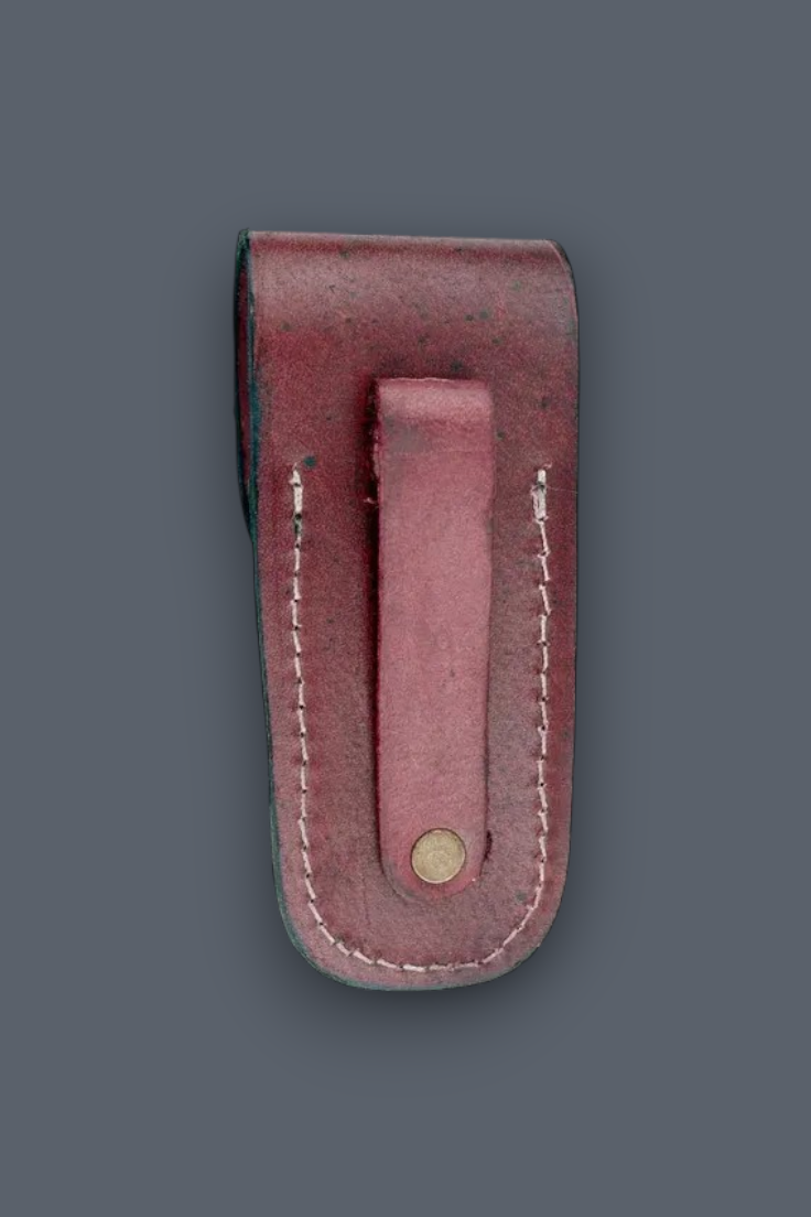 A reddish-brown leather belt holster or sheath with a matching leather belt loop and white contrast stitching, shown against a solid dark gray background.