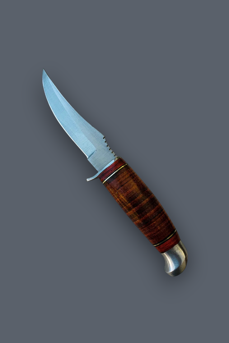 A fixed-blade knife with a curved silver steel blade and a polished reddish-brown wooden handle with a silver bolster, shown diagonally on a solid dark gray background.