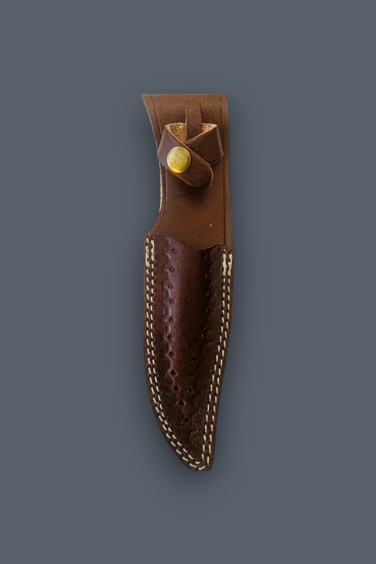 A brown leather knife sheath with a textured pattern, contrast stitching, and a brass rivet, shown against a solid dark gray background.