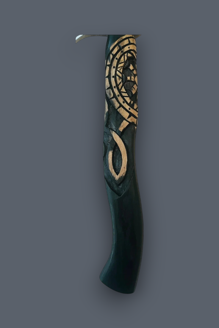 A dark green wooden wall hook with intricate gold Norse-style runic carvings, shown against a solid dark gray background.