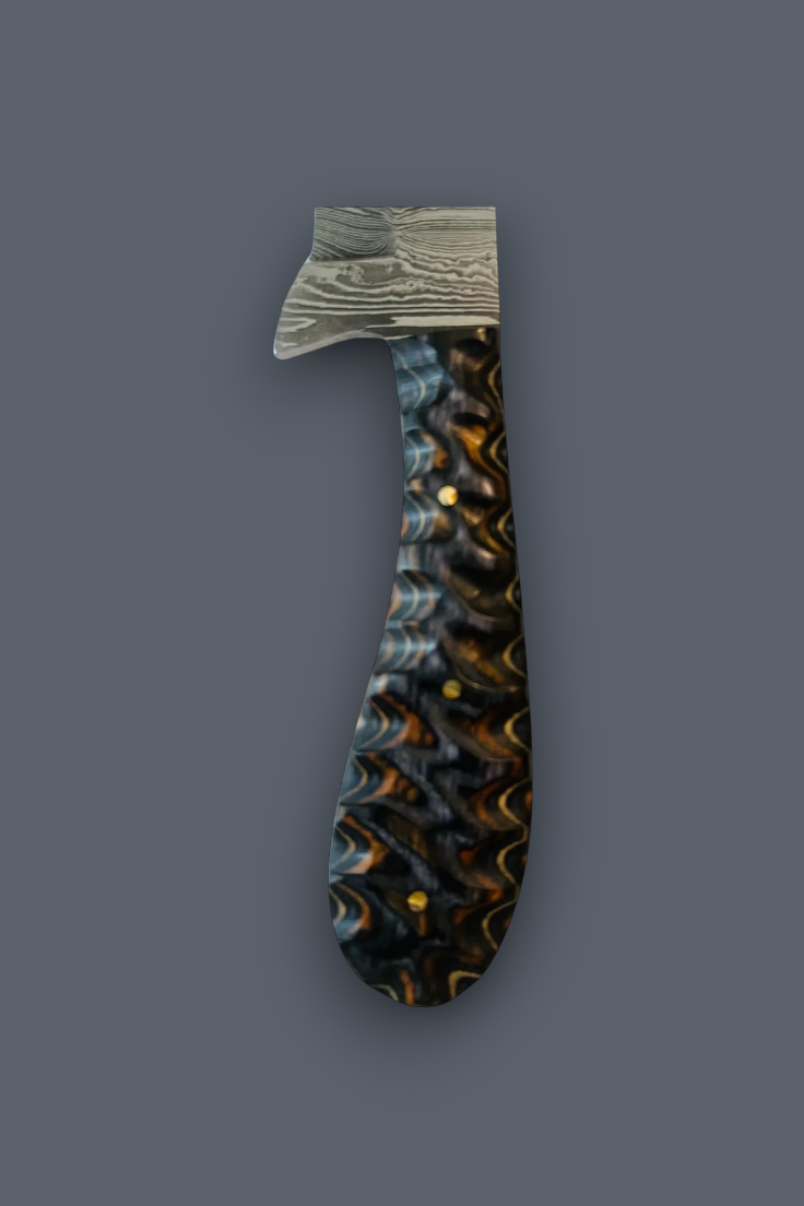 A decorative dagger or letter opener with a textured, patterned handle in black, gold, and blue, and a silver-gray patterned blade, shown against a solid dark gray background.