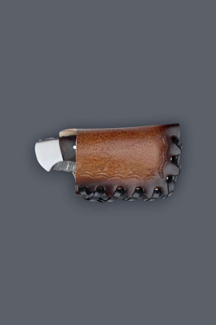 A brown leather knife sheath holding a folding knife with a silver blade, shown against a solid dark gray background.
