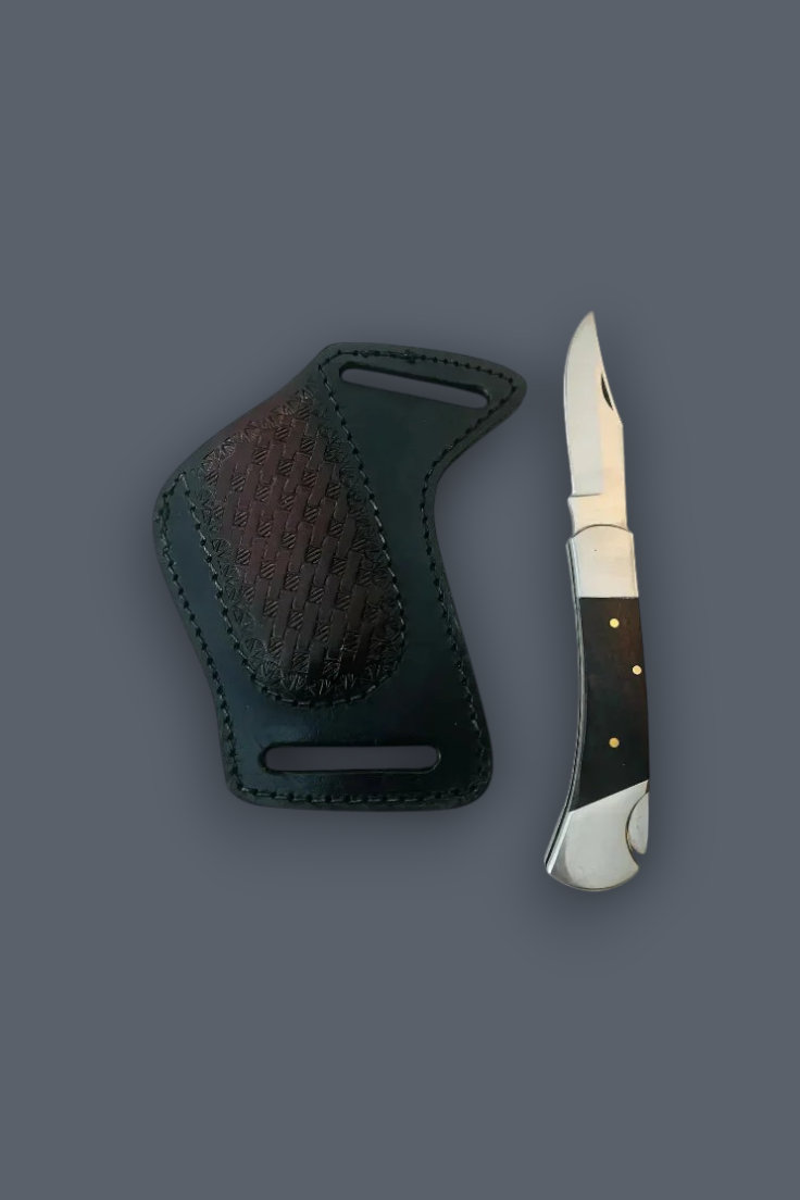 A compact folding pocket knife with sheath with a dark handle and silver blade, displayed next to its dark green leather sheath on a solid dark gray background.