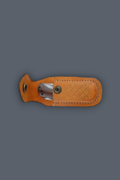 A tan leather knife sheath with a partially open knife showing a silver blade, set against a solid dark gray background.