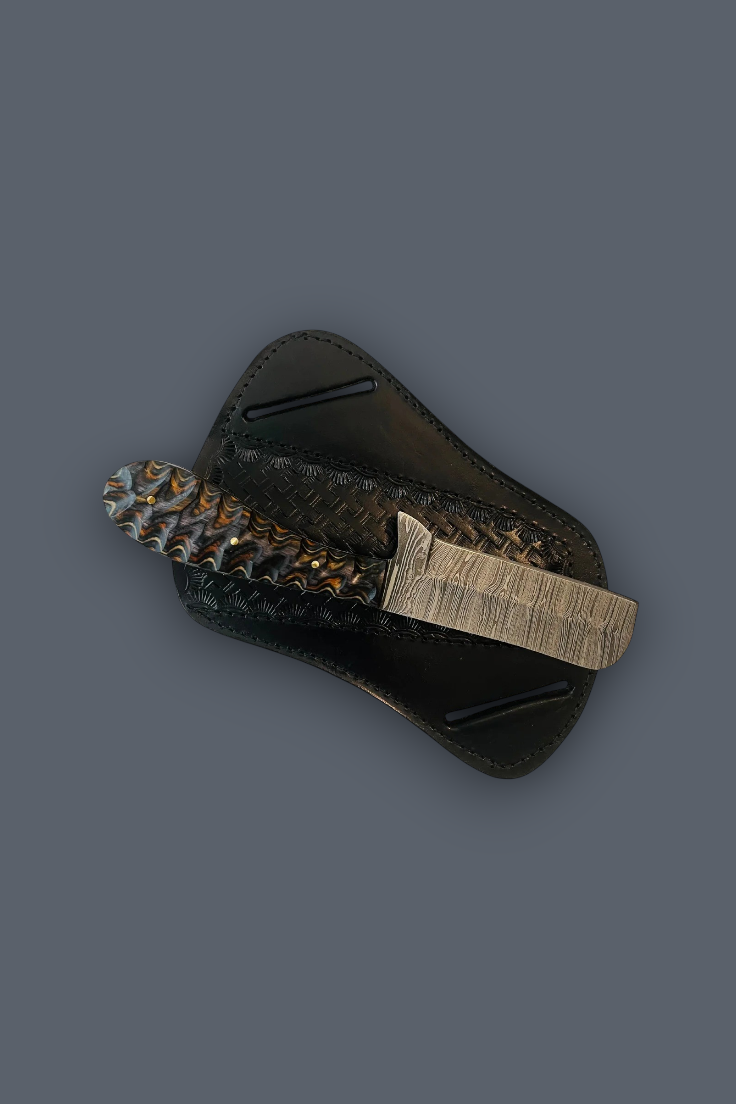 A fixed-blade knife with a textured metallic handle and a dark textured sheath, displayed on a solid dark gray background.