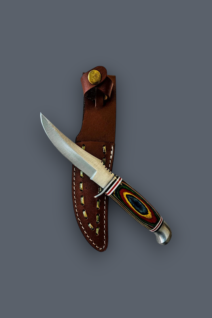 A fixed-blade knife with a silver blade and a colorful handle, displayed diagonally next to its brown leather sheath on a solid dark gray background.