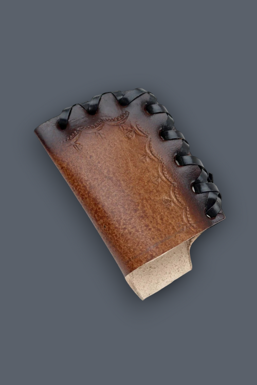 A brown leather knife sheath with decorative stitching and a light-colored wooden handle, shown on a solid dark gray background.