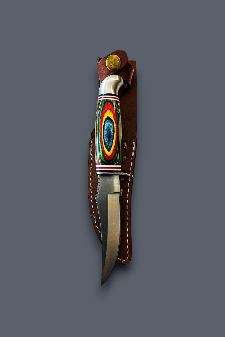 A fixed-blade knife with a colorful inlay handle, shown partially inserted into a brown leather sheath against a solid dark gray background.