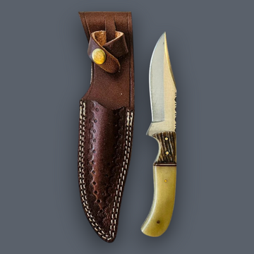 A fixed-blade knife with a curved yellow bone handle and a textured brown leather sheath with white stitching, displayed side-by-side on a solid dark gray background.
