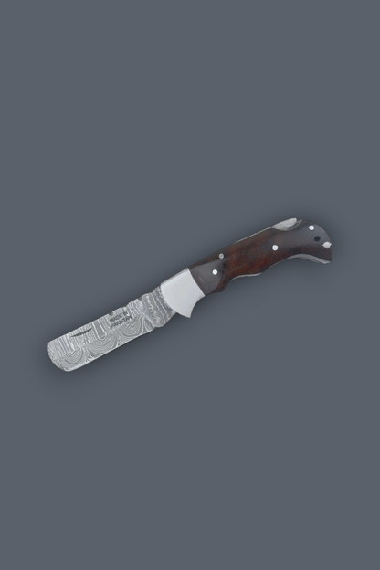 A fixed-blade knife with a patterned steel blade and a dark brown wooden handle, shown diagonally on a solid dark gray background.