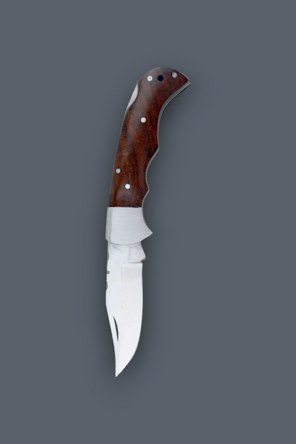 A fixed-blade knife with a polished silver blade and a reddish-brown wooden handle secured by silver pins, shown vertically against a solid dark gray background.