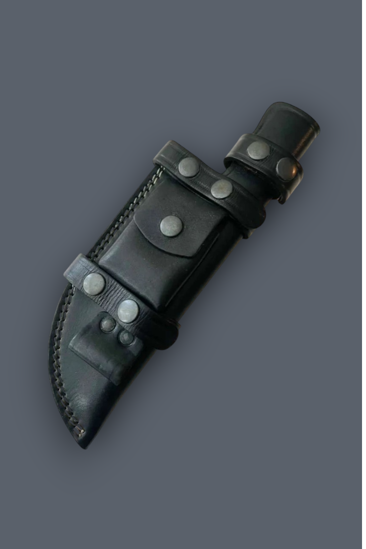 A black leather knife sheath with silver-toned metal rivets and a matching black leather belt loop, shown on a solid dark gray background.