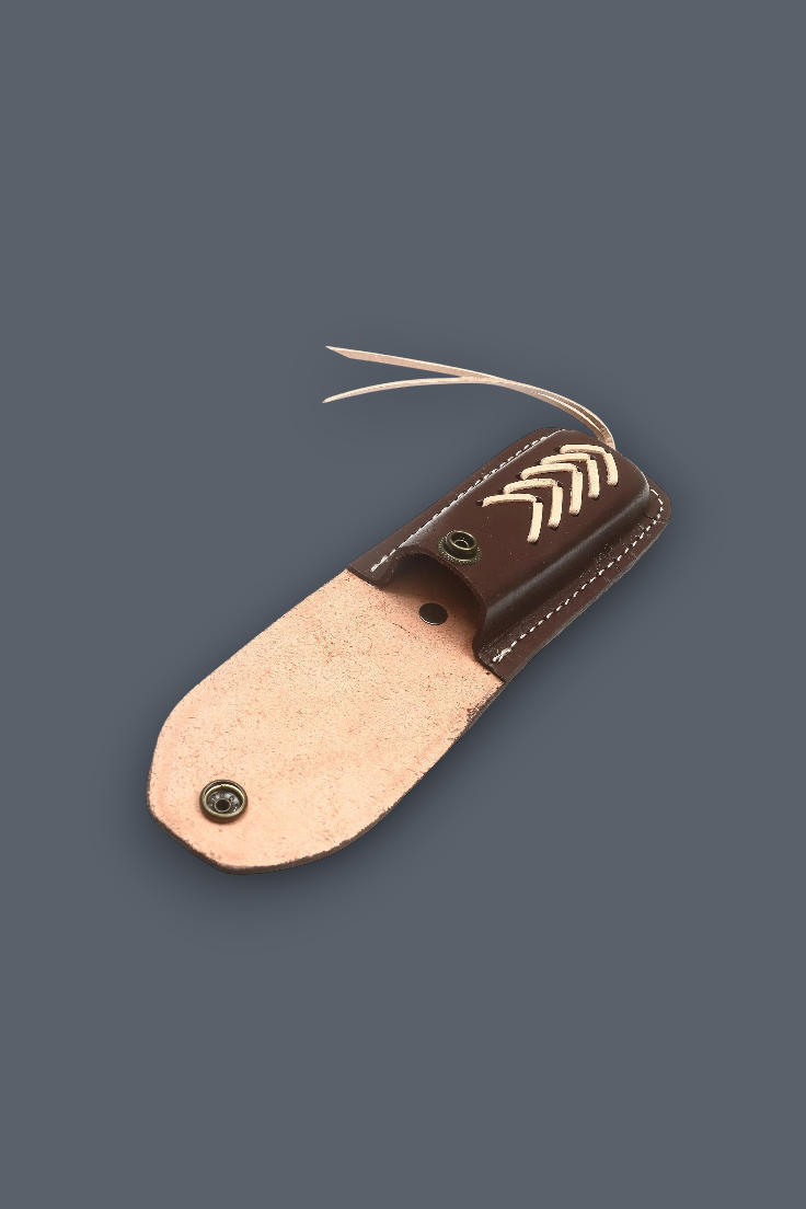 Premium handcrafted brown leather folding knife sheath shown open, featuring durable stitching, lace detailing, and a secure snap-button closure.