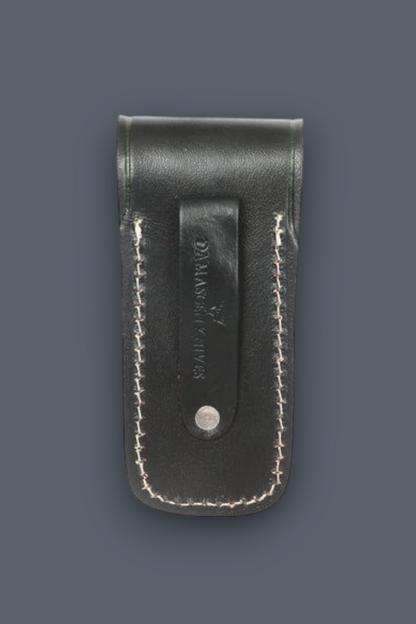 A Back Side  dark brown leather Sheath with a  button closure and an embossed eagle emblem on the flap, shown against a solid dark gray background.