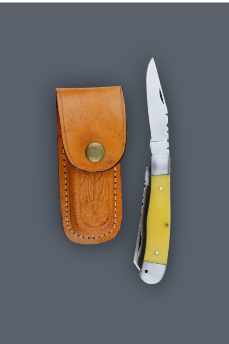 A folding pocket knife with a yellow handle and silver blade, shown next to its brown leather sheath on a solid dark gray background.