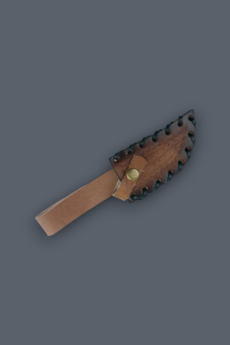 A small knife with a tan leather handle and a dark brown leather sheath featuring serrated edges and a brass snap, shown on a solid dark gray background.