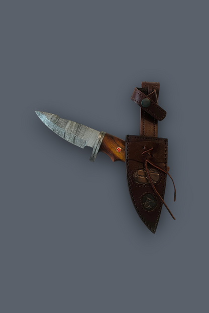 A fixed-blade knife with a textured silver blade, brown wooden handle, and a dark brown leather sheath, shown against a solid dark gray background.